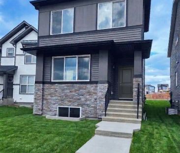 Experience modern living in a 3-story home with AC for summer comfo... - Photo 1