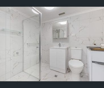 Stylish Renovation Meets Unbeatable Convenience - Photo 4