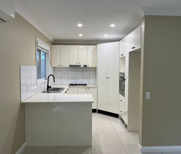 Contemporary granny flat with a magical backyard - Photo 3