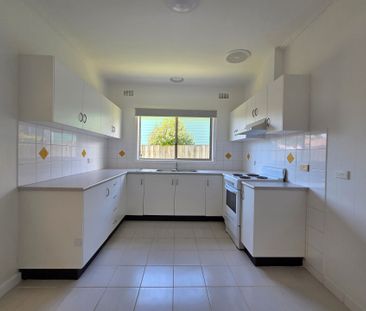 Freshly Painted Home in Ideal Location - Photo 6