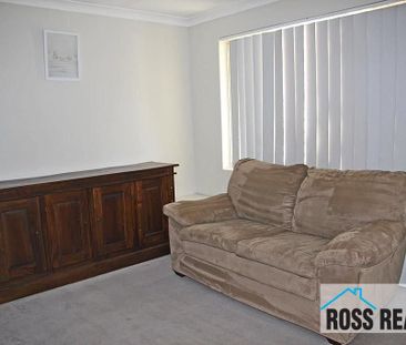WELL-PRESENTED 3X1 HOME IN ULTRA-CONVENIENT LOCATION - Photo 2