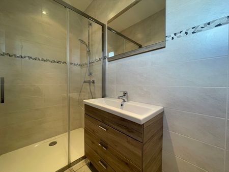 Woning met polyvalente ruimte en 4 slaapkamers - Photo 4