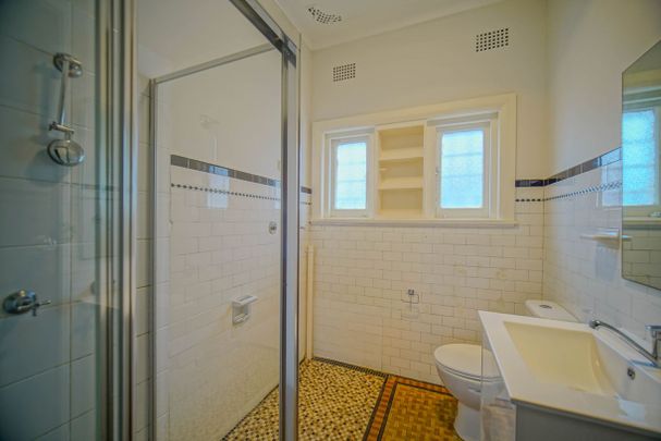 Spacious 3-Bedroom Home with Yard & Parking - Photo 1