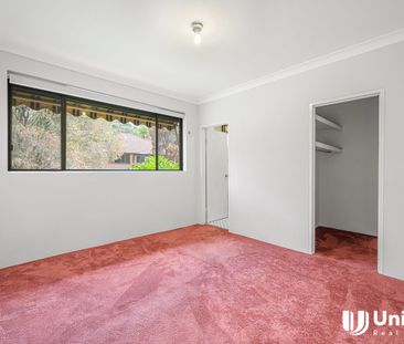 Charming Three-Bedroom Home in Prime Location - Photo 1