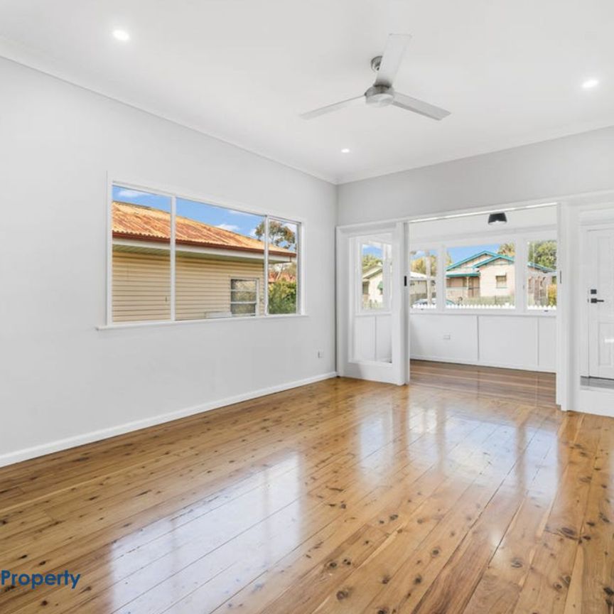 Charming Family Home with Spacious Entertaining & Modern Comforts - Photo 1