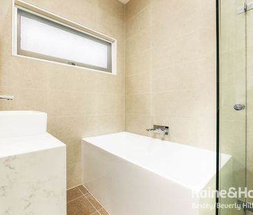 Near New & Stunning Two Bedroom Apartment! - Photo 4