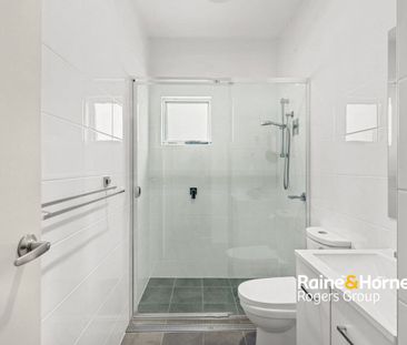 Modern Haven with Lawn Maintenance Included - Photo 3