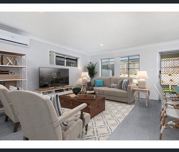 SPACIOUS AIR-CONDITIONED FAMILY HOME WITH LOW MAINTENANCE YARD - Photo 1