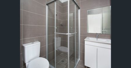 Spacious Two Bedroom Townhouse with Three Car Garage - Photo 4