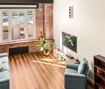 Character-Filled Three-Bedroom Warehouse Apartment with River Views - Photo 3