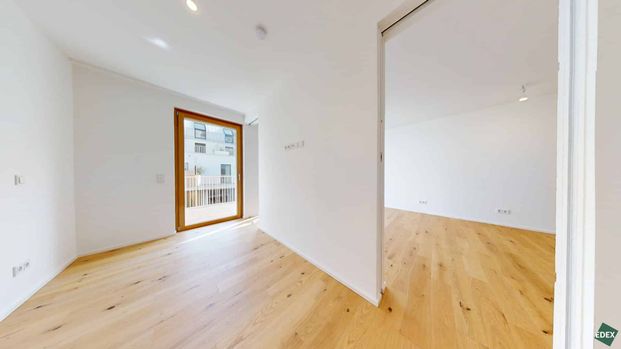 ERSTBEZUG | Klimatisierte W2-Zimmer-Wohnung mit Balkon, Garagenplatz optional - Photo 1