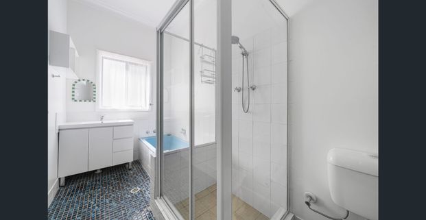 Spacious & Charming 3-Bedroom Home - Photo 1