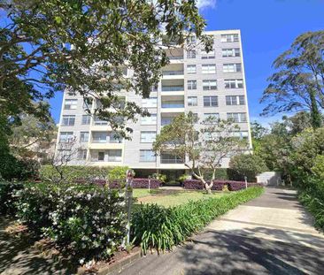 IMPECCABLY RENOVATED APARTMENT OFFERING COMFORT, STYLE AND CONVENIENCE - Photo 2