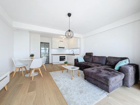 Gerenoveerd appartement met 1 slaapkamer op de zeedijk in Knokke-Heist - Photo 3