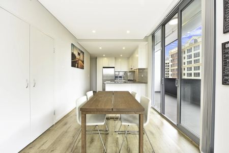 Top-Floor Penthouse with Dual Balconies | District Views - Photo 3