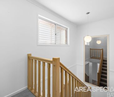 Elevated Family Home with Water Glimpses & Room to Move! - Photo 1