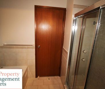 Charming 3-Bedroom Home with Spacious Living and Family-Friendly Fe... - Photo 6