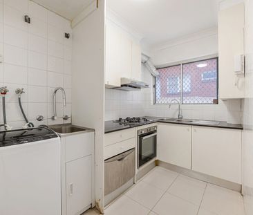 Bright and tidy two-bedroom brick unit with private balcony - Photo 3