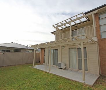 Perfectly Positioned Townhouse - Photo 1