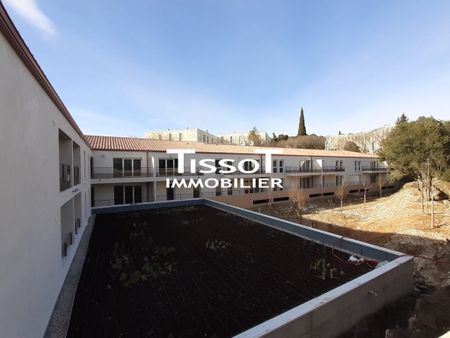 Location Appartement 3 pièces 64m² NIMES 30000 - Photo 3