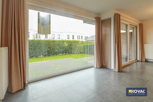 Gelijkvloers appartement met tuin en garage! - Photo 1