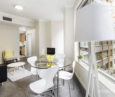 BOUTIQUE DESIGNER ABODE | Furnished - Photo 4