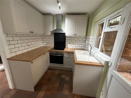 A three-bedroom semi-detached cottage located in the village of Llangedwyn. - Photo 5