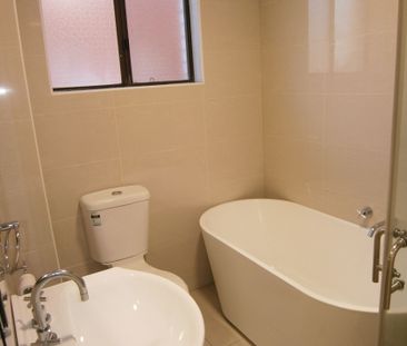 Renovated Two Bedroom Unit + Large Garage - Photo 5