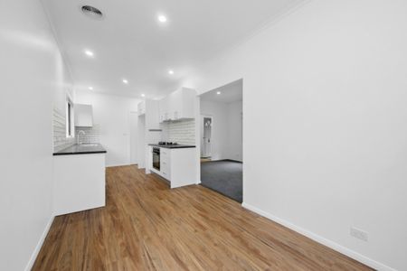 Renovated 3 Bedroom Townhouse in Great Location - Photo 2