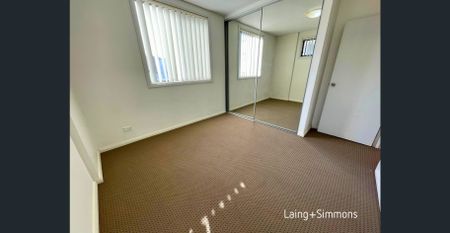Well presented two-bedroom unit - Photo 4