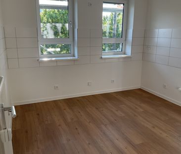 Für Aufsteiger: Moderne Wohnung im Dachgeschoss ohne Aufzug - Foto 1