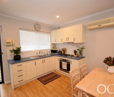 Open the Door To Coastal Convenience with a Private Courtyard Retreat - Photo 3