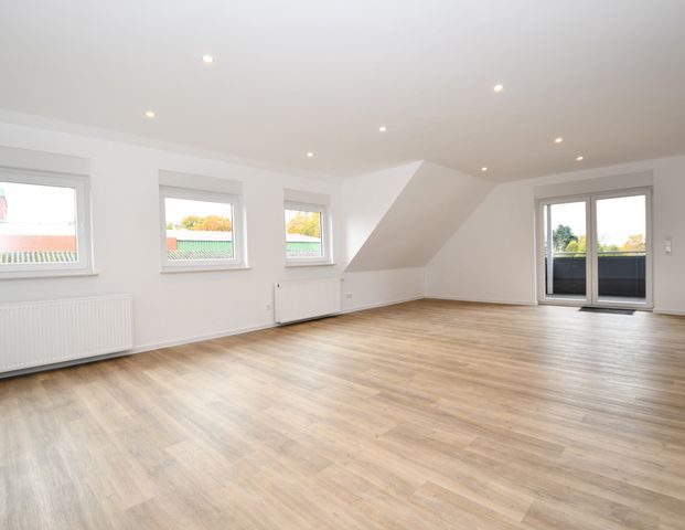 Wohnen mit Wohlfühlcharakter - Mietwohnung mit Balkon, Einbauküche und E-Ladestation in Altenoythe - Photo 1