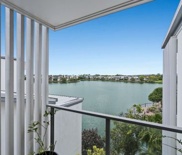 Elegant Waterfront Townhouse in the Heart of Emerald Lakes - Photo 1