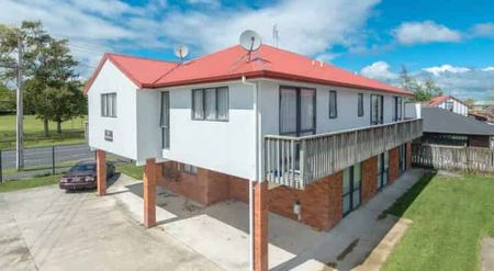 Sunny Upstairs Studio Unit with a Balcony - Photo 5