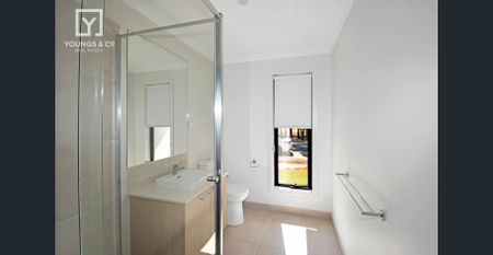 BRAND NEW FOUR BEDROOM - TWO LIVING AREAS - Photo 4