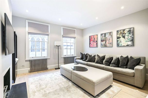 Well presented house with a very large decked terrace, moments from High Street Kensington - Photo 1