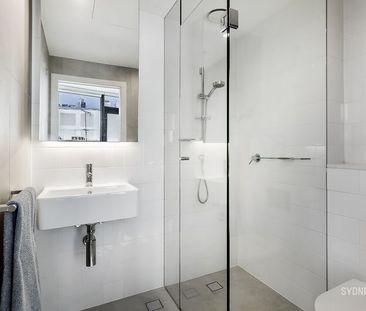 SOPHISTICATED CITY PAD WITH STORAGE CAGE | Furnished - Photo 4