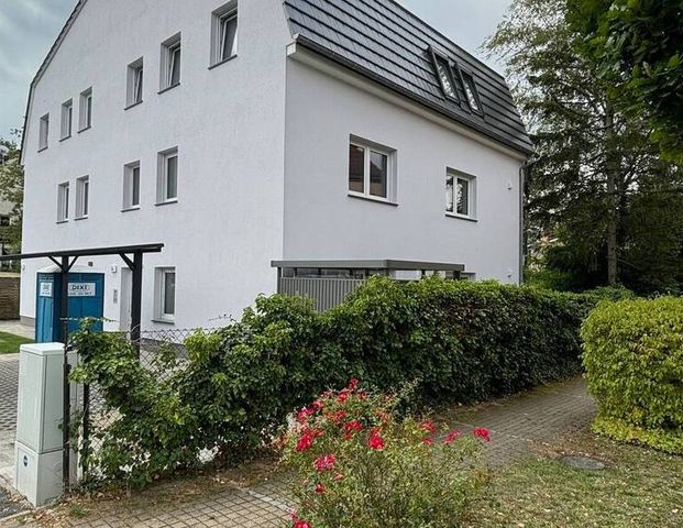 Wohnung im EG mit Terrasse und kleiner Gartenfläche - Photo 1
