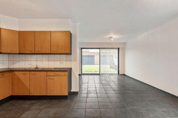 Gelijkvloers appartement met 2 slpks, tuin en garagebox - Photo 1