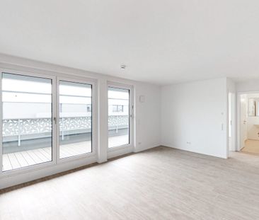 Penthousewohnung mit Blick über die Dächer Langens - Foto 4