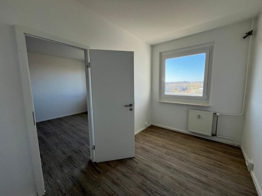 Tolle Wohnung in der 10. Etage im Hochhaus - Photo 1