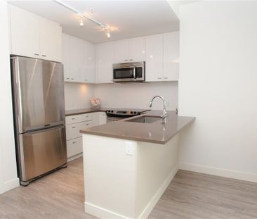 Spacious One Bedroom Corner Unit by New Skytrain Station - Photo 1