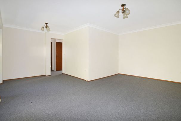 CONVENIENTLY LOCATED TWO BEDROOM VILLA - Photo 1