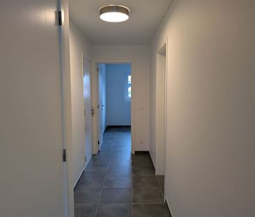 Gelijkvloers appartement met tuin en garage - Foto 4