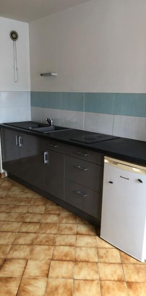 BELLIGNAT, dans copropriété appartement T2 d'environ 55m² avec balcon. - Photo 1