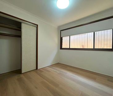 FOUR BEDROOM FAMILY HOME WITH POOL & DOUBLE GARAGE - Photo 4