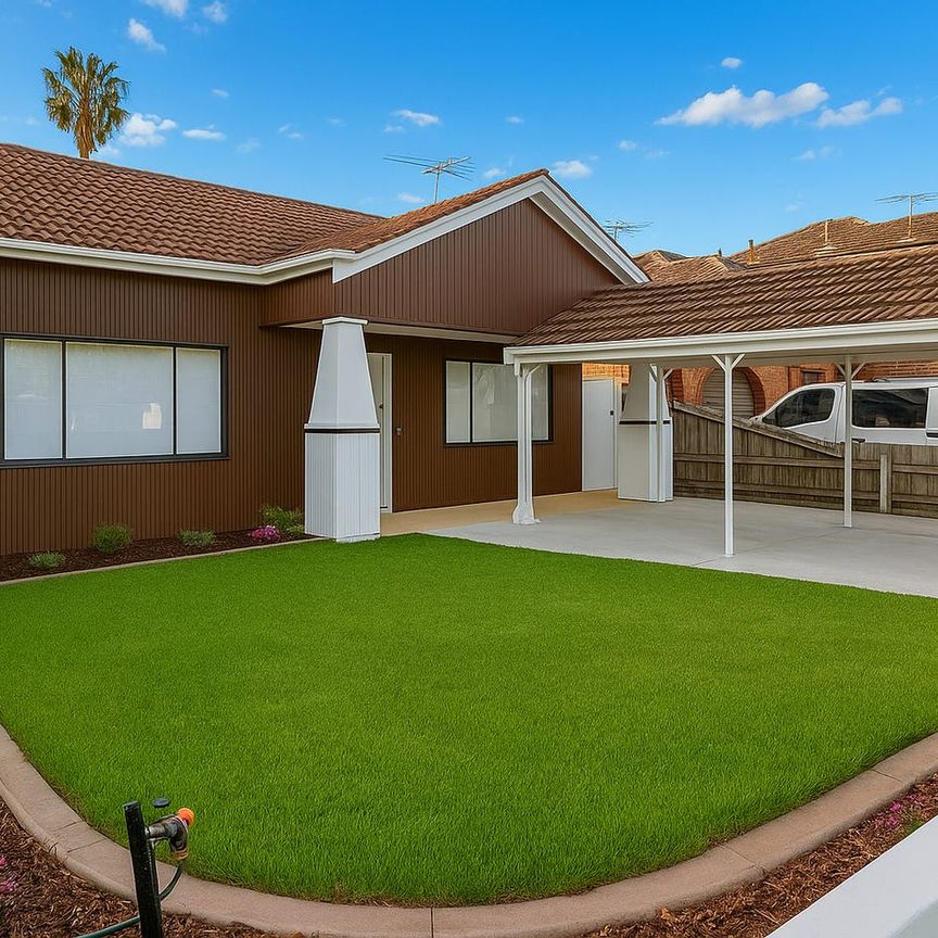 Luxuriously renovated home with landscaped gardens & security system - Photo 1