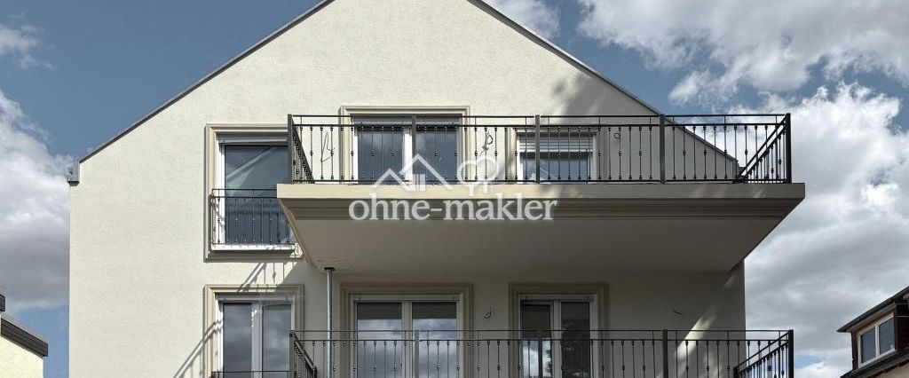 Erstbezug ab März 2026! Moderne 3-Zimmer-Neubauwohnung mit Balkon und Gartenblick im 1. OG - Photo 1