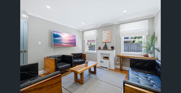 RENOVATED DESIGNER FURNISHED HOME - Photo 1